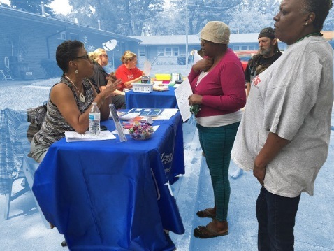 Sign up event for residents outside, sign up tables with staff to assist